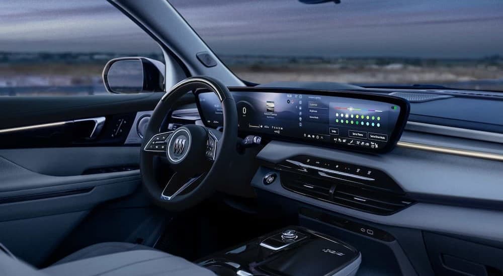 Gray dash in a 2026 Buick Enclave at a Buick dealer near Manhattan.
