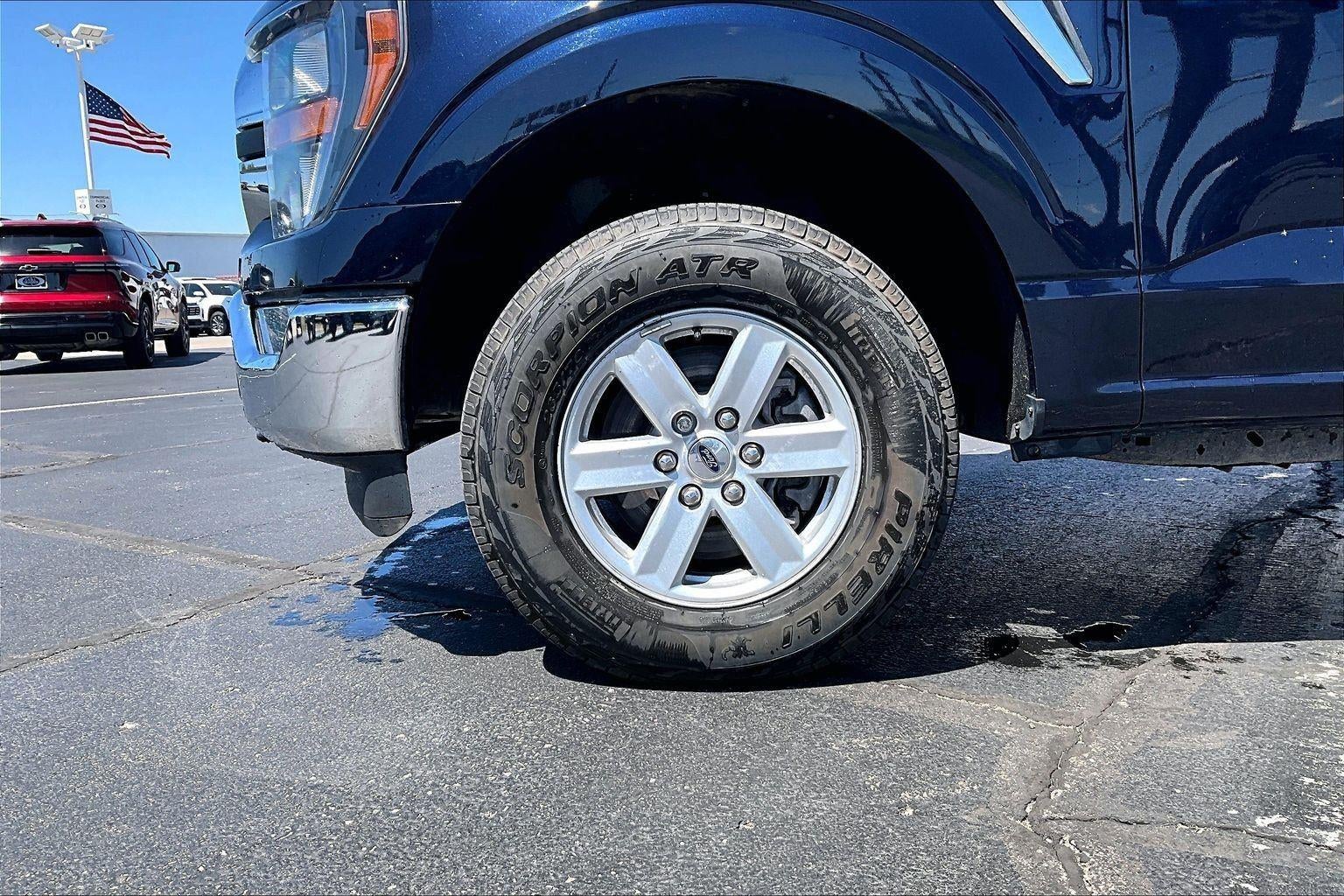 Used 2023 Ford F-150 XLT with VIN 1FTFW1E84PKF63113 for sale in Kansas City