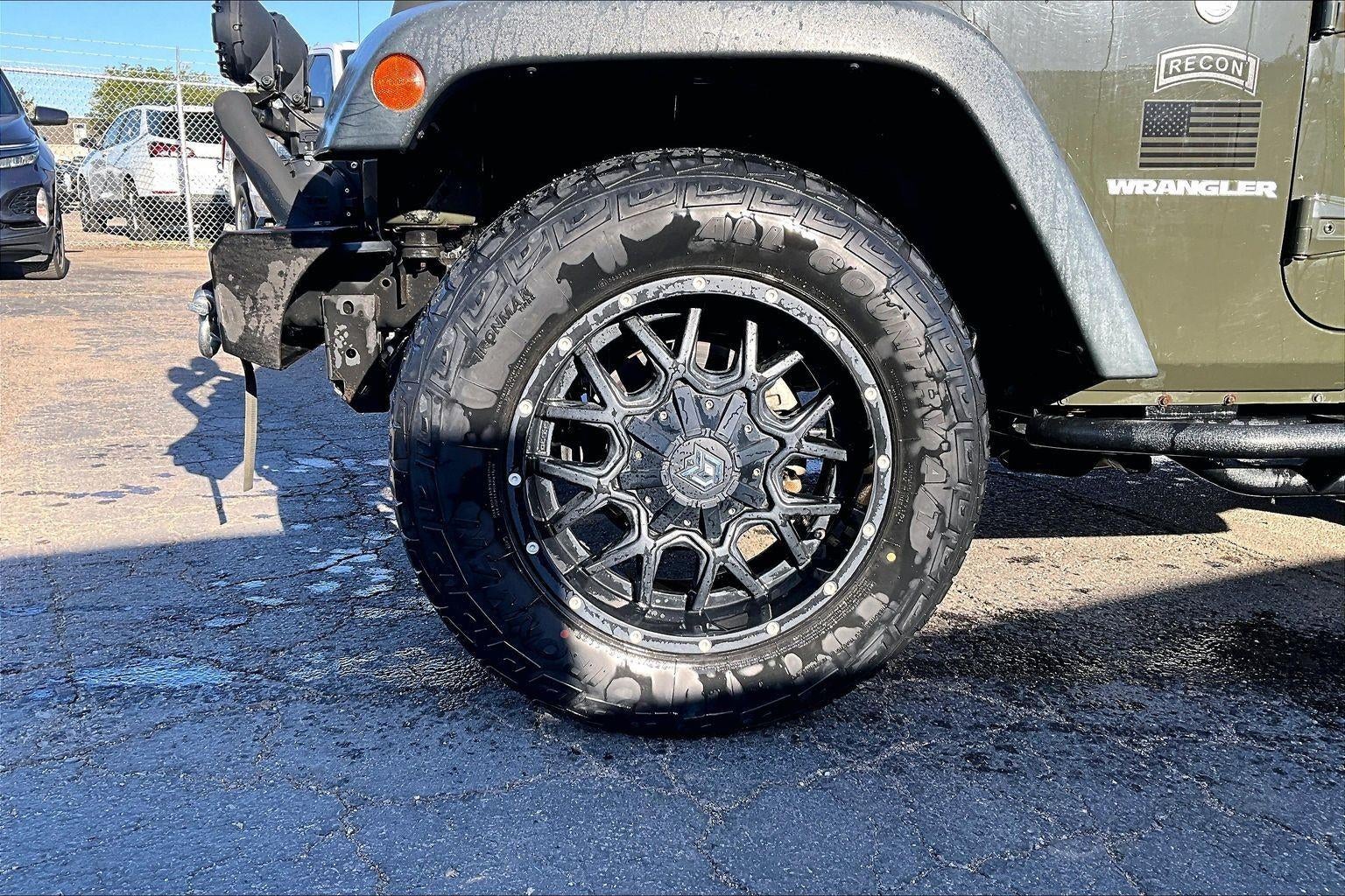 Used 2015 Jeep Wrangler Sport with VIN 1C4AJWAG0FL702343 for sale in Kansas City