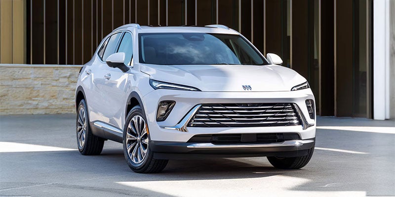 Customer shaking hands with Cable Dahmer Chevrolet of Kansas City employee