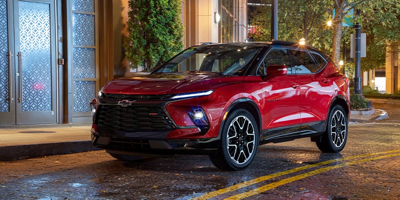 A red 2023 Chevy Blazer from the front at an angle.