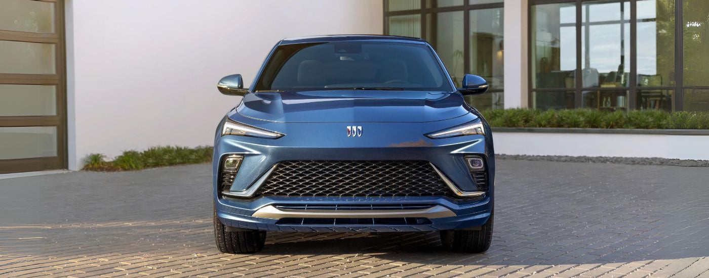 Blue 2024 Buick Envista Avenir parked head on