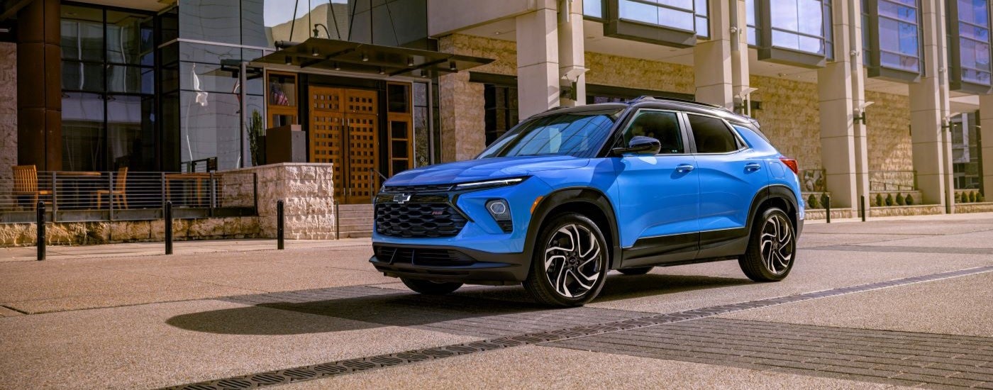 Blue 2024 Chevy Trailblazer RS driving to a Chevy dealer near Ottawa
