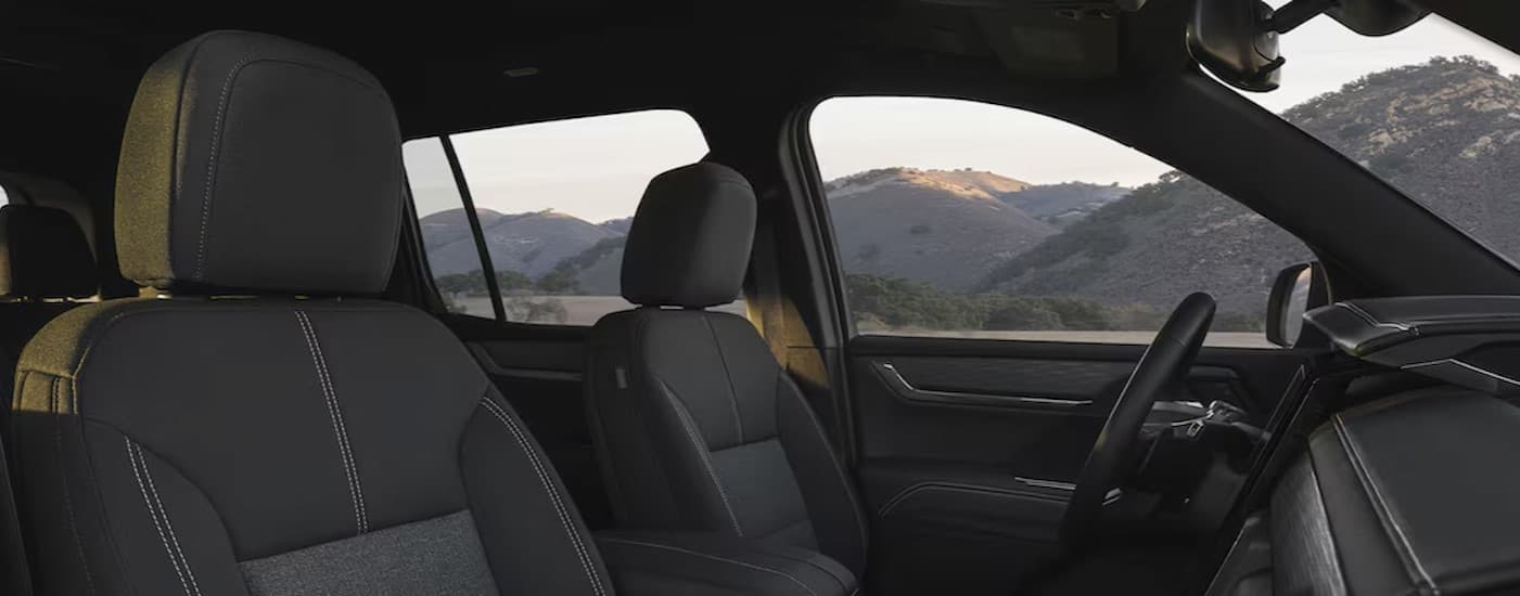 The gray interior in a 2025 GMC Acadia.