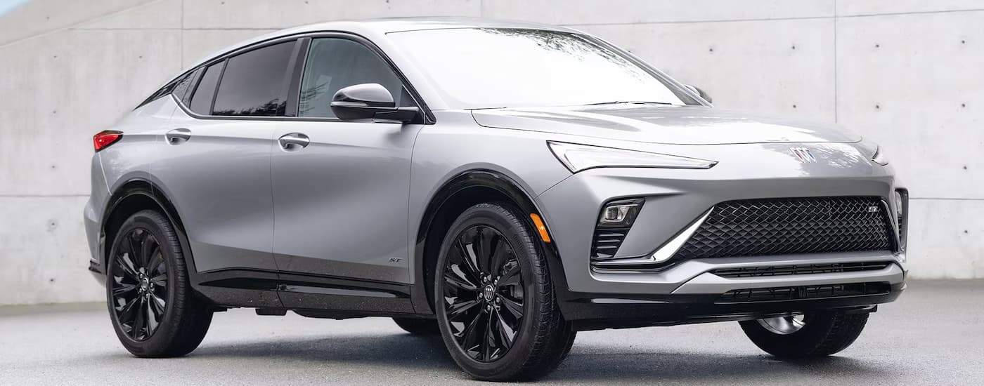 A silver 2025 Buick Envista parked at a Buick dealer near Kansas City