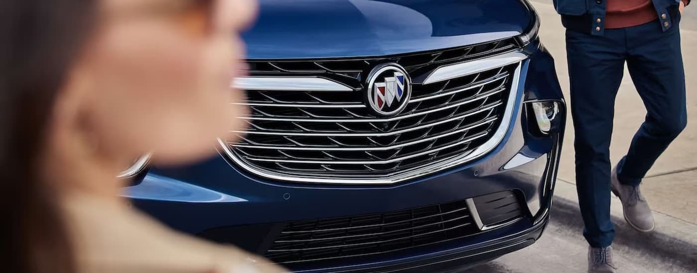 Close-up of the grille on a blue 2024 Buick Enclave.